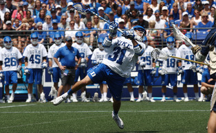 Senior Jordan Wolf's goal with 23 seconds remaining sealed the win and title for Duke. Senior Jordan Wolf's goal with 23 seconds remaining sealed the win and title for Duke.