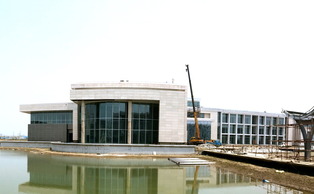 A panoramic view of the back of DKU's academic building and its signature water pavilions. A panoramic view of the back of DKU's academic building and its signature water pavilions.