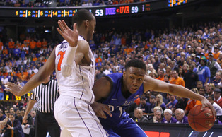 Virginia's Akil Mitchell forced Jabari Parker to work for each of his 23 points. Virginia's Akil Mitchell forced Jabari Parker to work for each of his 23 points.
