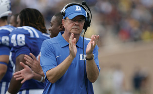 Duke head coach David Cutcliffe received high praise from former Blue Devil head coach Steve Spurrier for revitalizing the Blue Devil program. Duke head coach David Cutcliffe received high praise from former Blue Devil head coach Steve Spurrier for revitalizing the Blue Devil program.