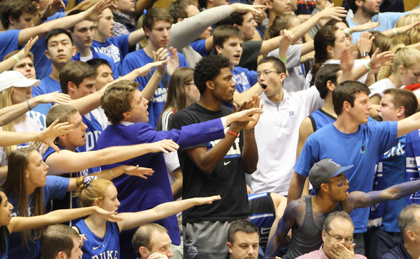 Duke signee Justise Winslow spent the second half of Monday's win against Virginia watching the game with the Cameron Crazies.