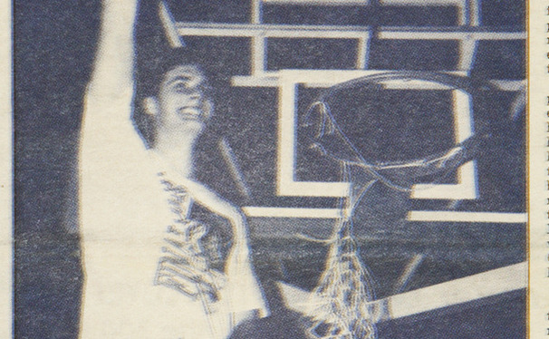 Christian Laettner cuts down the net following Duke's 1992 Elite Eight