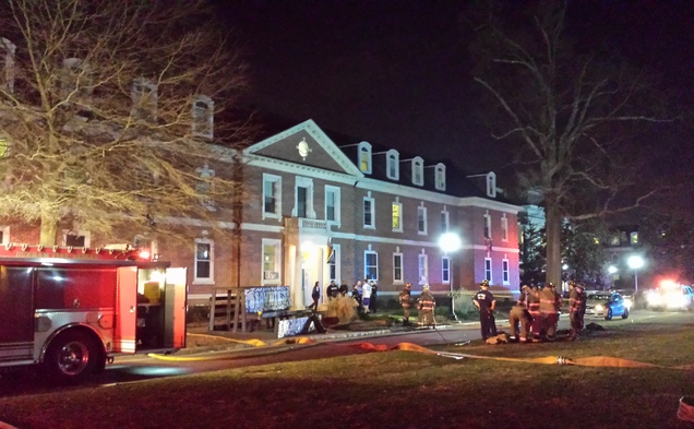 Fire trucks line up outside of Brown Dormitory to put out the fire.