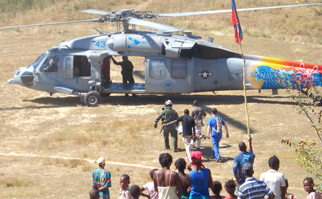 The Duke medical team in Haiti evacuates an earthquake victim via helicopter to the USNS Comfort, a navy hospital ship, for surgical treatment.