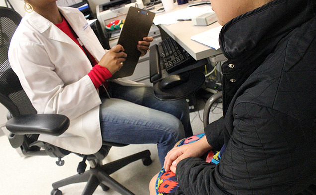 A physician reads the state-mandated script to a patient seeking an abortion as part of the Woman’s Right to Know Act. North Carolina abortion providers are currently fighting certain aspects of the act.