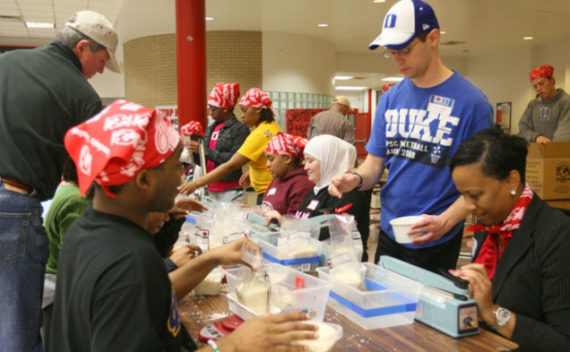 During the annual MLK Million Meals Service Event, local community members and Duke students pack meals for victims of the earthquake in Haiti. The volunteers packed a total of 50,000 meals Wednesday evening.
