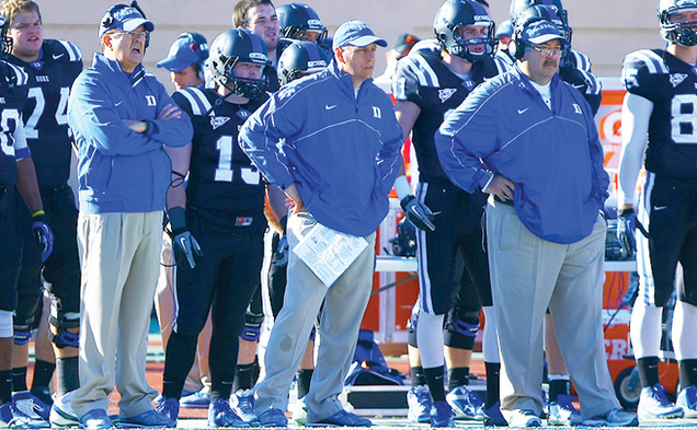 Kurt Roper has coached with David Cutcliffe (left) since they were together at Tennessee in 1998.