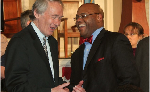Sen. Mo Cowan, Trinity '91,(r) chats with Rep. Ed Markey, D-Mass. at an event celebrating the career of John Kerry.