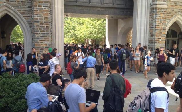 Students gathered outside Perkins and Bostock Libraries following a false fire alarm Wednesday afternoon.